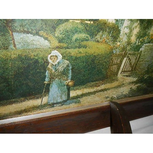 824 - A framed and glazed print of a needlepoint of Anne Hathaway's cottage.  COLLECT ONLY.