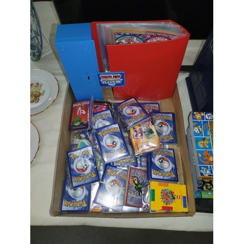 272 - 2 boxes of collectables & cards mainly Pokemon related including foils etc. Dr Who Tardis cardholder... 