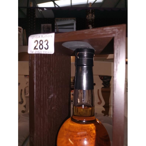 283 - A sealed bottle of Highland Queen Majesty 21 year old Scotch whisky