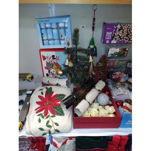 286 - A large quantity of Christmas decorations. COLLECT ONLY