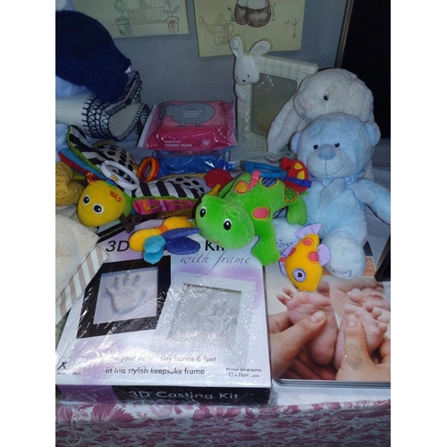 289 - A large quantity of baby related soft toys, bedding, photo's & pictures etc.