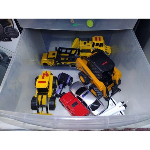 291 - Two 3 drawer storage containers & contents of toy vehicles