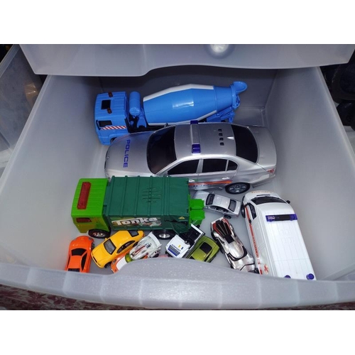 291 - Two 3 drawer storage containers & contents of toy vehicles