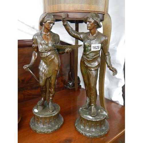 1628 - A pair of spelter figures.