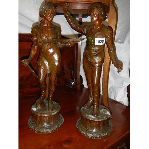 1628 - A pair of spelter figures.