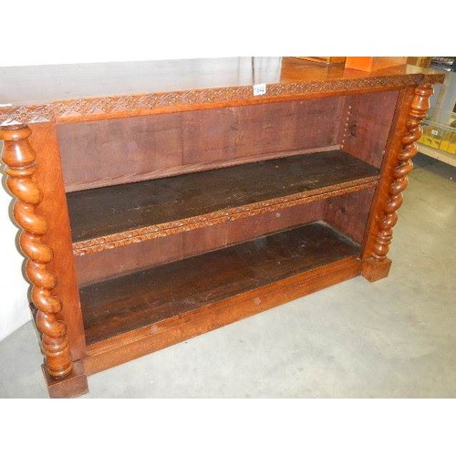 1642 - A carved bookcase. COLLECT ONLY.