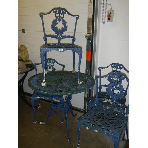 1648 - A metal garden table and four chairs, COLLECT ONLY.