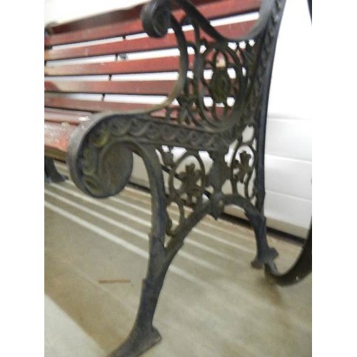 1652 - A metal and wood garden bench, COLLECT ONLY,.