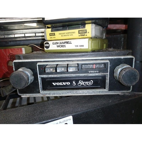 426 - A large 1950's push button (maybe Ford) radio & an original Volvo 8 stereo 8 track/radio with a lot ... 