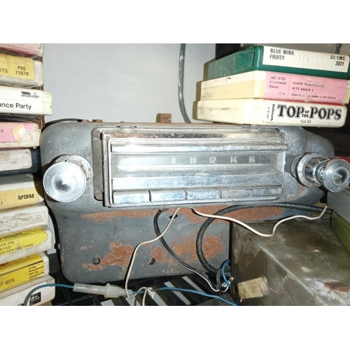 426 - A large 1950's push button (maybe Ford) radio & an original Volvo 8 stereo 8 track/radio with a lot ... 