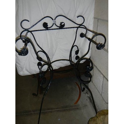 1664 - A wrought iron chair style plant stand. COLLECT ONLY.