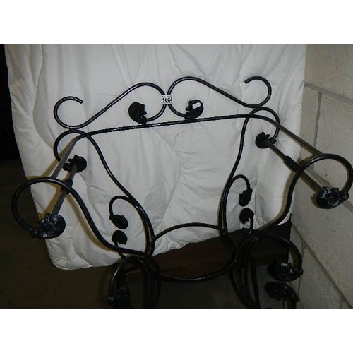 1664 - A wrought iron chair style plant stand. COLLECT ONLY.