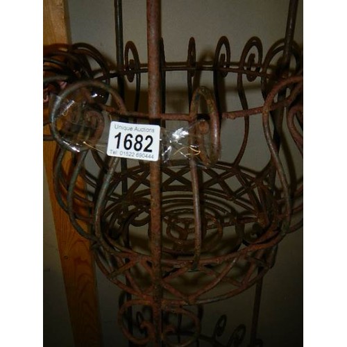 1682 - A wrought iron plant stand, COLLECT ONLY.