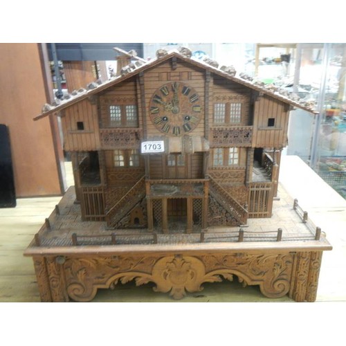 1703 - A rare Victorian Black Forest Swiss cottage musical box/clock.  Chimes on the hour and half hour, mu... 