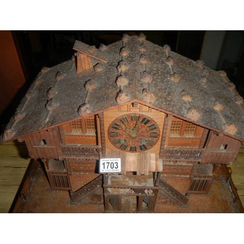 1703 - A rare Victorian Black Forest Swiss cottage musical box/clock.  Chimes on the hour and half hour, mu... 