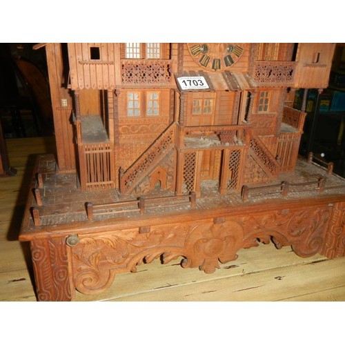 1703 - A rare Victorian Black Forest Swiss cottage musical box/clock.  Chimes on the hour and half hour, mu... 