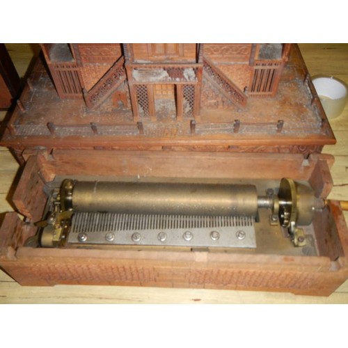 1703 - A rare Victorian Black Forest Swiss cottage musical box/clock.  Chimes on the hour and half hour, mu... 