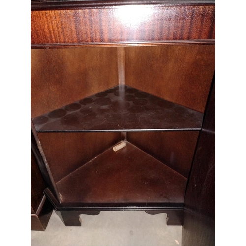 309 - A dark wood stained corner cupboard with cut glass door panel. 70cm x49cm x Height 184cm (COLLECT ON... 