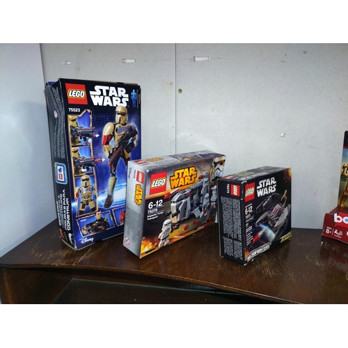 356 - A Star Wars related toys including Lego 75073 sealed, plus Star Wars 2008 Disney Parks Exclusive Bat... 