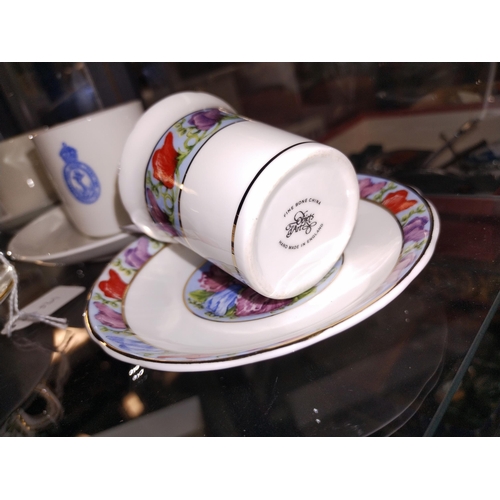 372 - A Royal Crown Derby tea cup and saucer plus 2 others