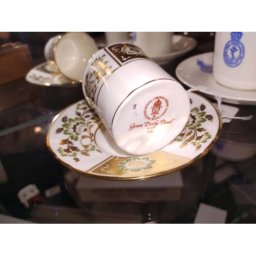 372 - A Royal Crown Derby tea cup and saucer plus 2 others