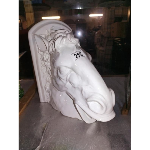 255 - A large white glazed pottery horses head wall bracket, top 16cm x 28.5cm, height 26cm