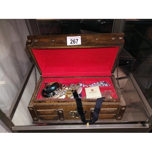 267 - A jewellery box and costume jewellery