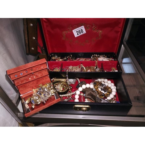 268 - A jewellery box and costume jewellery