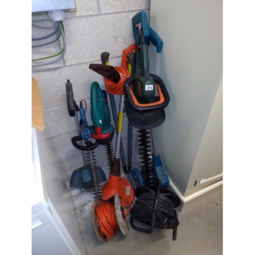 375 - A quantity of electric garden tools including hedge trimmers & strimmer's etc. Untested sold as is, ... 