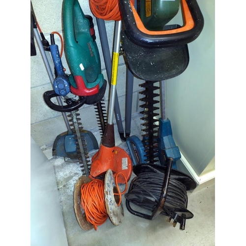 375 - A quantity of electric garden tools including hedge trimmers & strimmer's etc. Untested sold as is, ... 