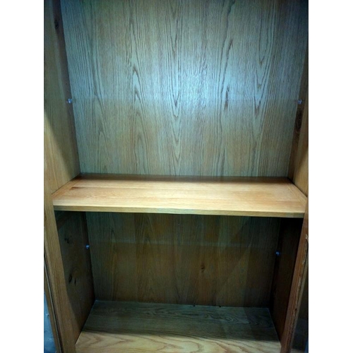 386 - A solid oak 2 door display cabinet with drawers (100cm x 40cm x 180cm) COLLECT ONLY