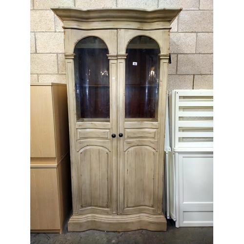 393 - A fabulous Serpentine front French style drinking/display cabinet with weathered finish & extra shel... 