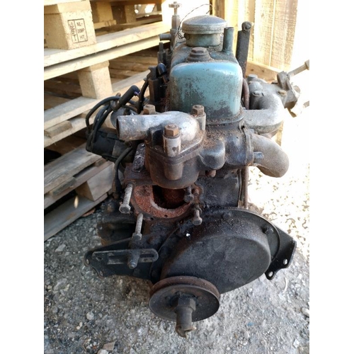 464 - A Morris Minor full engine including fuel pump, distributer, Ex manifolds & fly wheel etc.