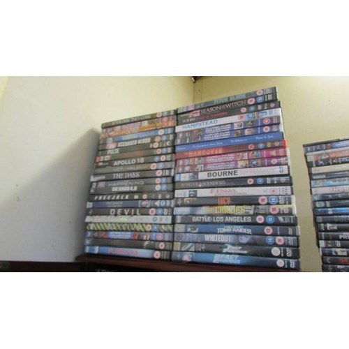 1 - A DVD cabinet with in excess of 150 DVD's and in excess of 70 CD's.