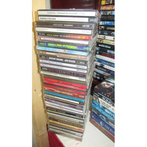 1 - A DVD cabinet with in excess of 150 DVD's and in excess of 70 CD's.