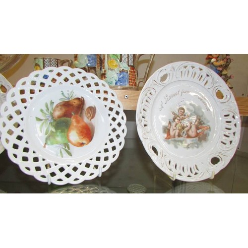 7 - Two Cherub and two floral ribbon plates.