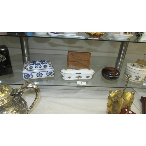 9 - Seven assorted trinket boxes.