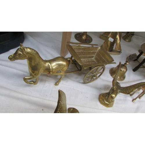 16 - A mixed lot of brassware including horse and cart, animals etc.,