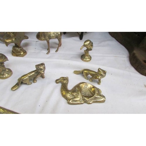 16 - A mixed lot of brassware including horse and cart, animals etc.,