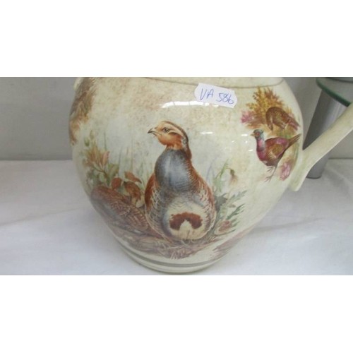 18 - A large Staffordshire pot hand painted with pheasants. COLLECT ONLY.