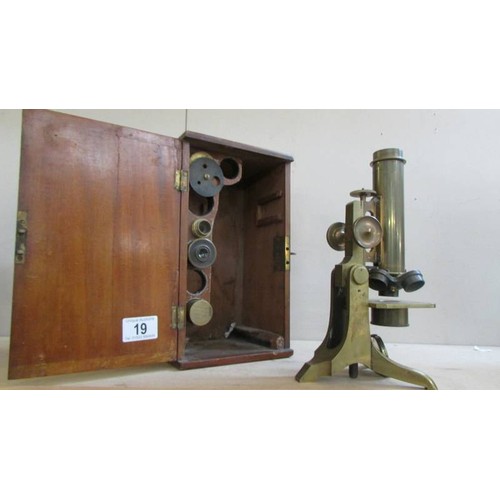 19 - A cased brass microscope, COLLECT ONLY