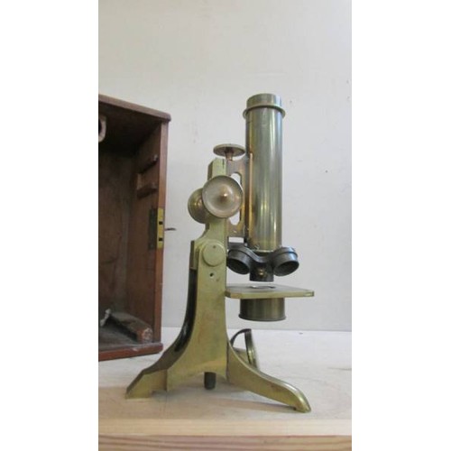 19 - A cased brass microscope, COLLECT ONLY