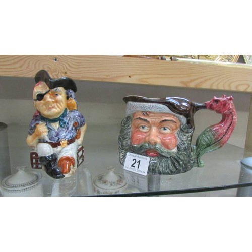 21 - A Shorter pirate jug and a Melba ware jug.