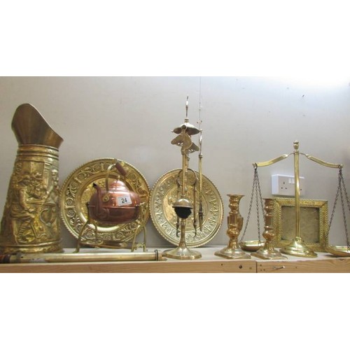 24 - A mixed lot of brass and copper including companion set, scales, kettle on stand etc., COLLECT ONLY.