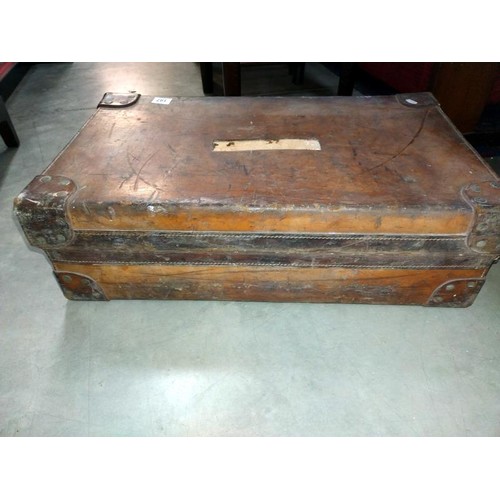 197 - A large early leather suitcase (missing brass plaque on lid)