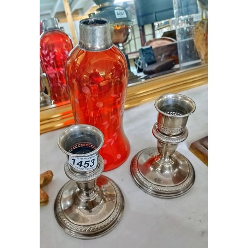 1453 - A pair of sterling silver candle lamps only 1 glass shade (marked sterling) COLLECT ONLY.