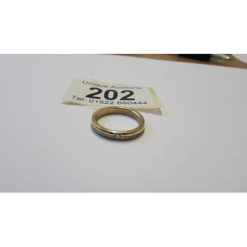 202 - A 9ct gold (tested) diamond solitaire ring, 3 grams, size L.