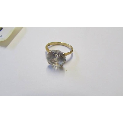 209 - A 9ct gold ring set large clear stone, size N.