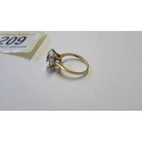 209 - A 9ct gold ring set large clear stone, size N.