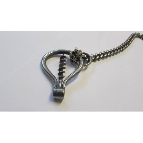 217 - An early 20C metal chain with old key and corkscrew.